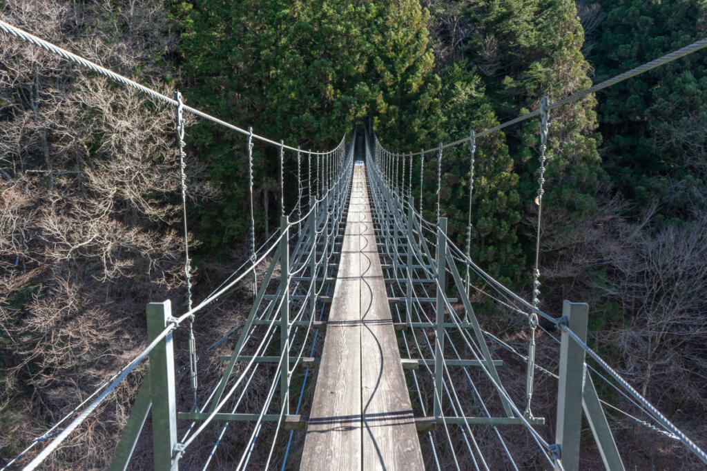 What is the origin of the name of Yumeno Igawa Suspension Bridge?